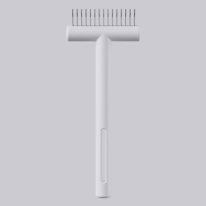 Safe-Edge Undercoat Rake in White, side view showing rounded safety-edge teeth